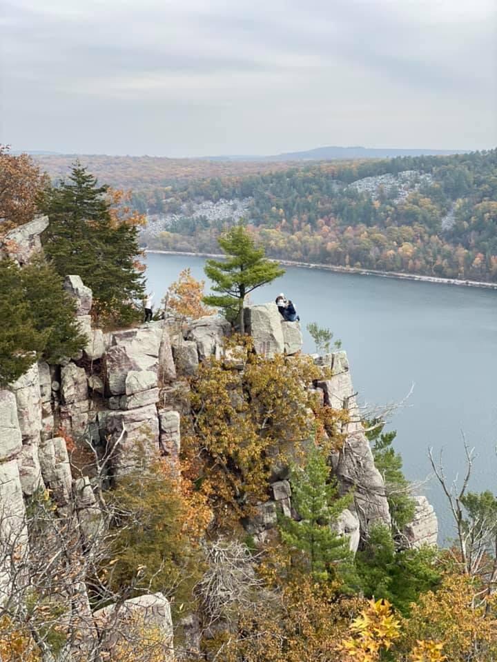 After about 4 years of dating, Dylan asked me to spend the rest of my life with him on the edge of a cliff at Devil's Lake State Park. I was already crying before he even asked because I was so scared to get on that cliff for the "picture." This was a really special day because Devil's Lake was already one of my favorite places (even more so now) and we were with some of our favorite people. I spent the rest of the day calling and texting everyone because I was so excited to share the news!