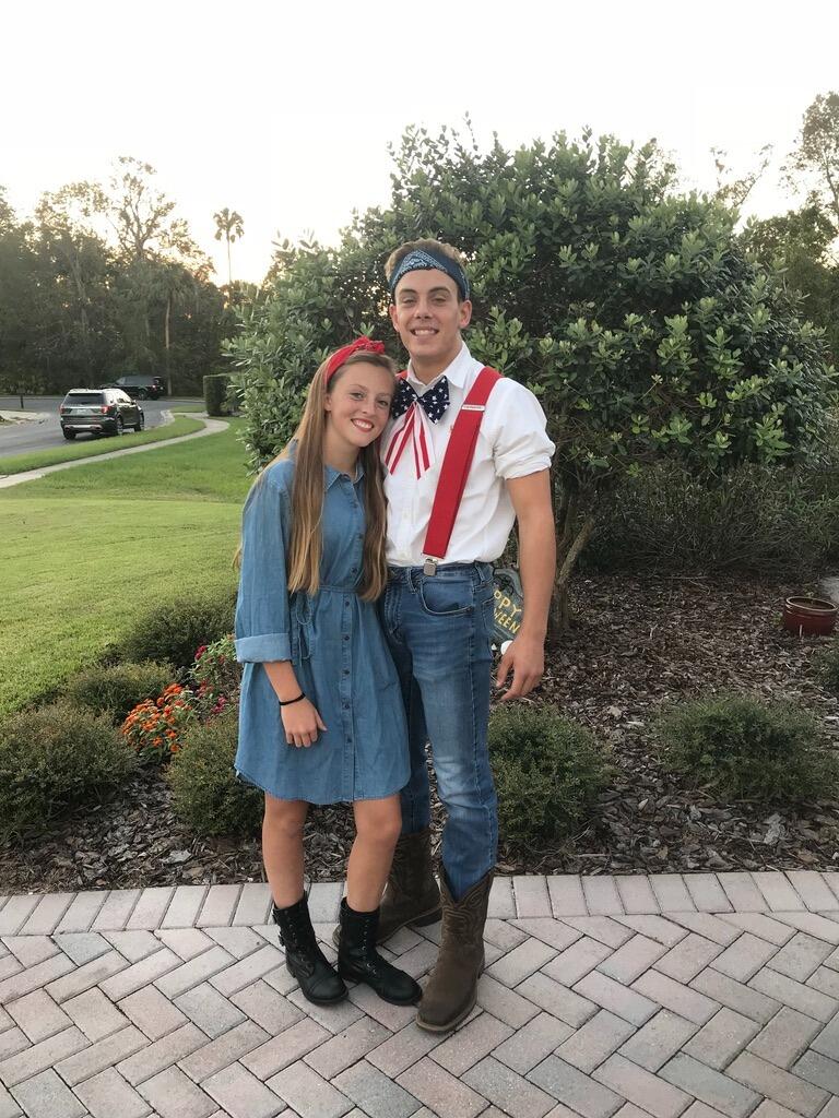Emma and Brett's first Halloween together! They dressed up as Rosie the Riveter and Uncle Sam!