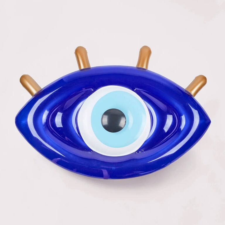 Evil eye shaped pool float from Sunnylife. 