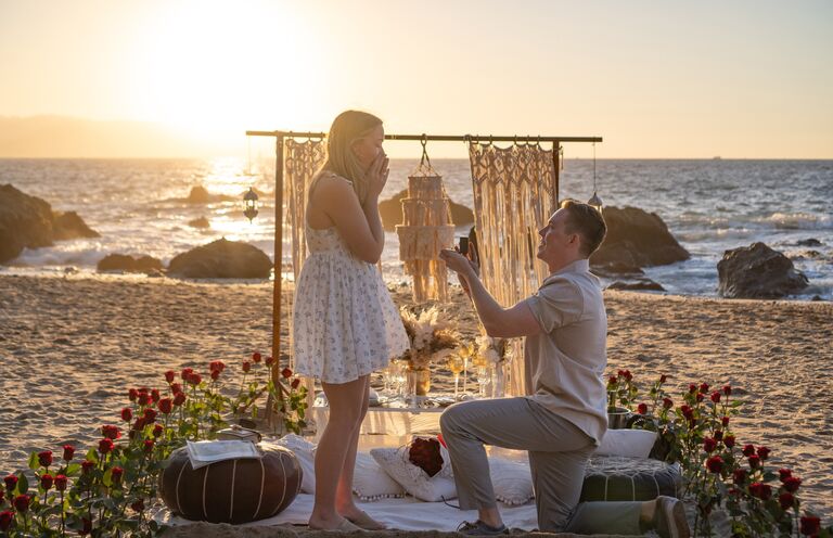 Kyle proposed to Jenna on the beach in Puerto Vallarta. Look at that sunset!