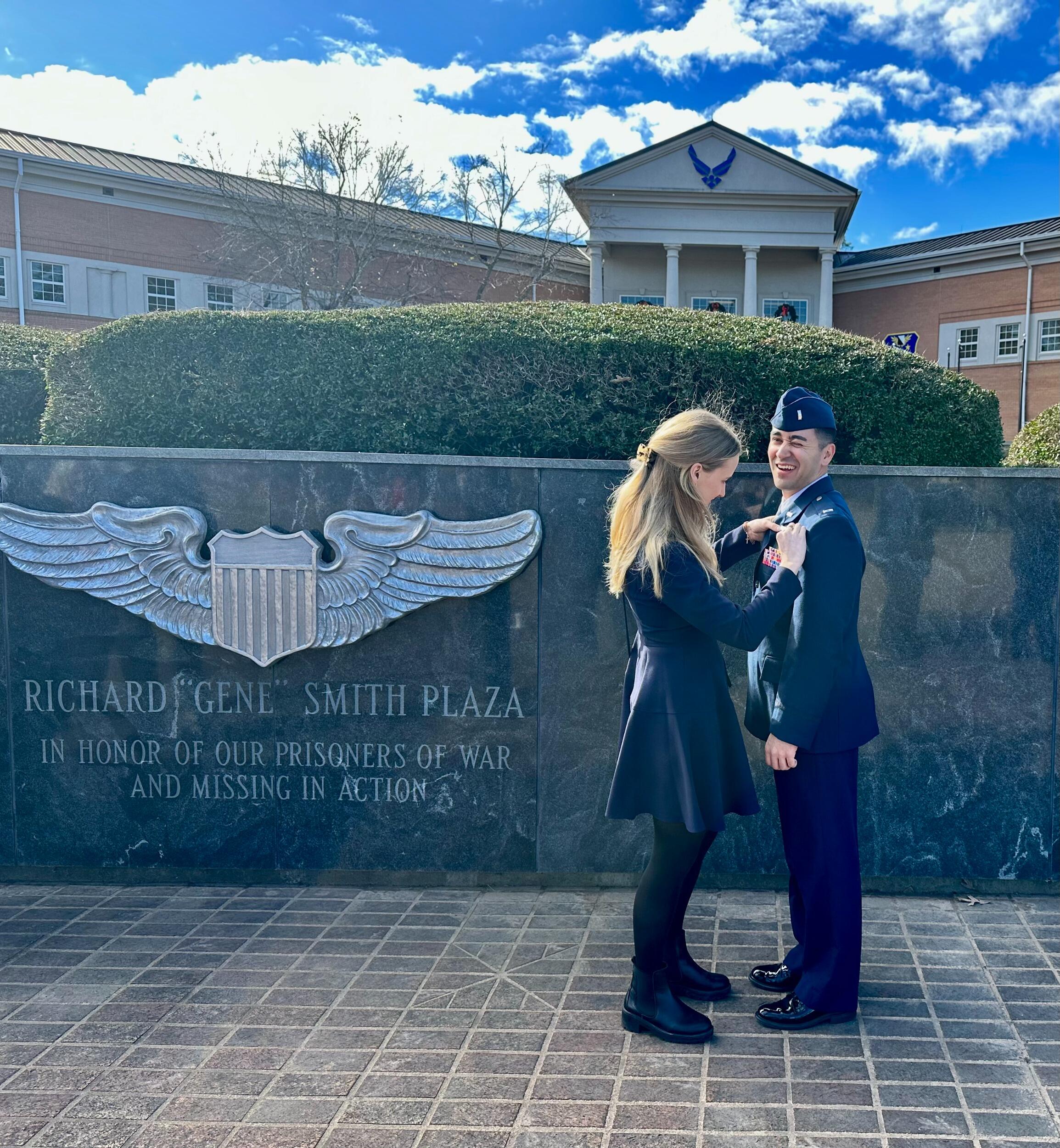 Olivia's turn to pin Mike with some silver wings. 