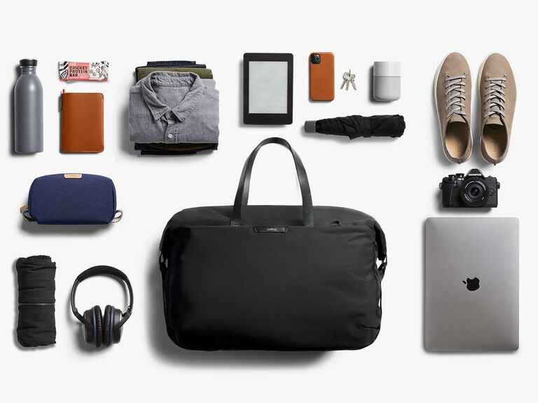 Bellroy weekend bag pictured with essentials that will fit inside great best man gift idea