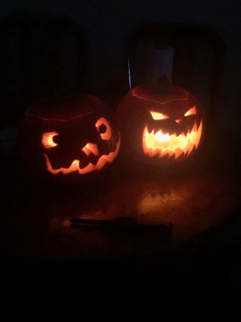 First time for someone carving a pumpkin- I think we all might all guess who is the pro!! 