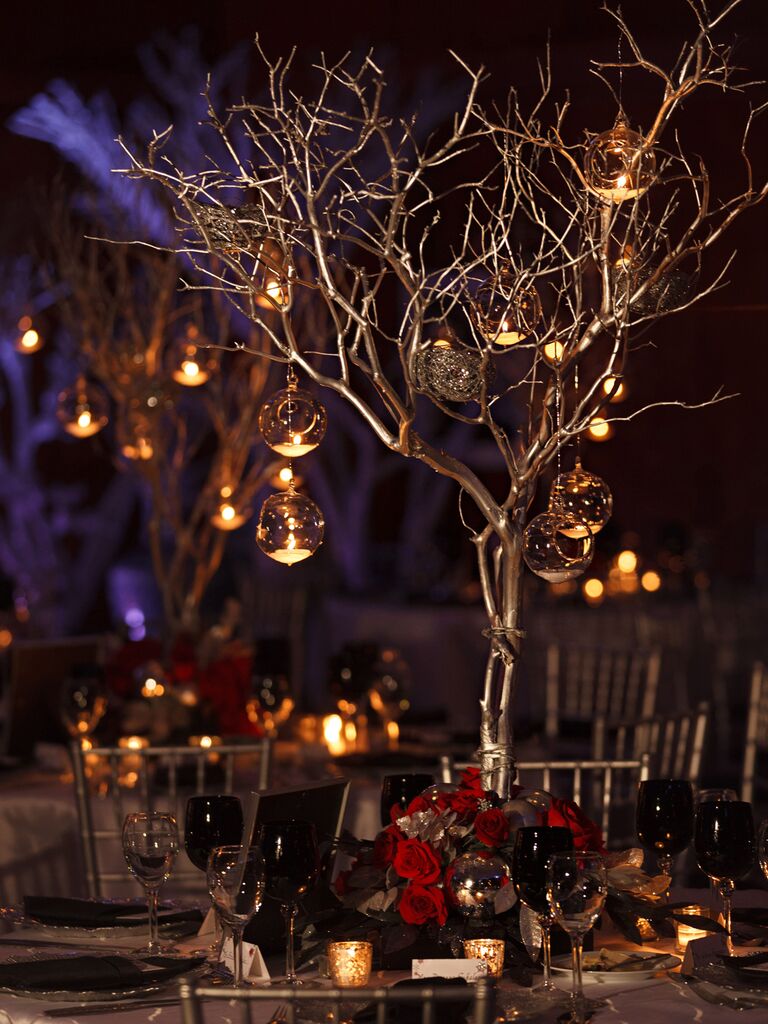 Tree Centerpiece Adorned With Ornament Candles