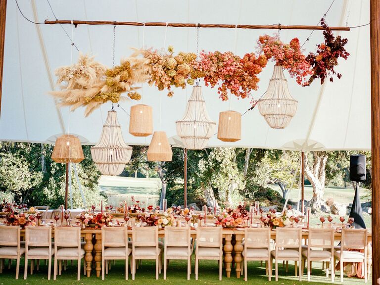 Suspended ombré floral installation at tented wedding reception