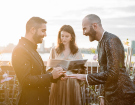 Couples exchanging vows on rooftop