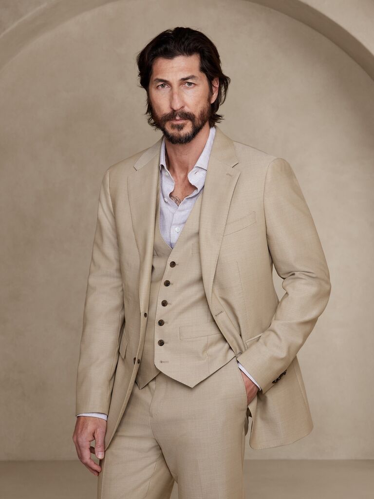 Tan three-piece suit for father of the groom by Banana Republic. 
