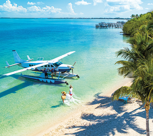 couple boarding seaplane in Key Largo, Florida