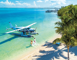couple boarding seaplane in Key Largo, Florida