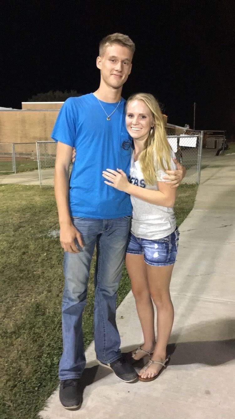 Our very first photo together! Taken after the homecoming game!