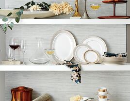 shelves with china and other dinnerware