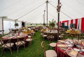 Outdoor event tent with circus-themed reception