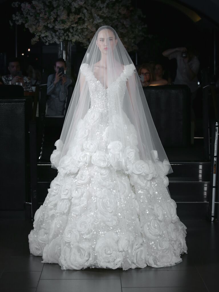 Floral embellished maximalist wedding dress, fashion trends 2024