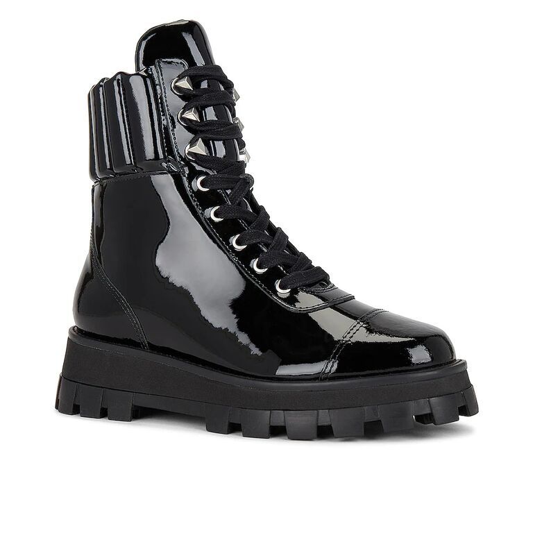 Shiny black leather combat boots with a chunky base. 
