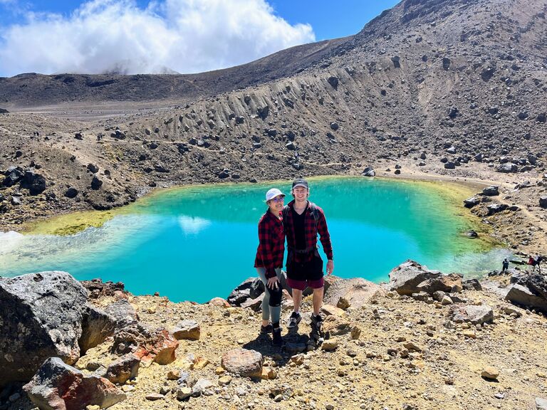 With her engagement ring in hand (the one ring), their first destinations was an easy 20 km vertical hike with elevation changes of 2,300 meters that took the couple 6 hours to climb Mount Doom (Much faster than Frodo and Sam in the LOTR). 
(Tongariro Crossing - New Zealand)