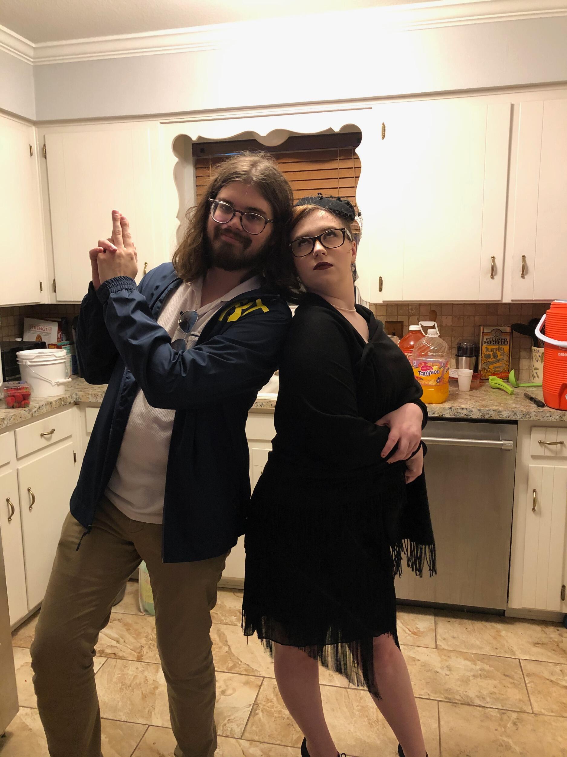 Grace and Brandon attend a Halloween party as Burt Macklin and Janet Snakehole!