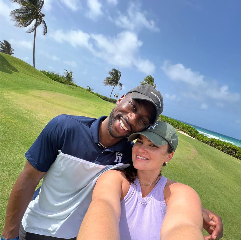 Chloe and Kevon golfing in Montego Bay, Jamaica on a family vacation with the Blacks.