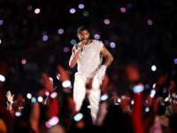 Usher performing at Super Bowl 2024 Halftime show