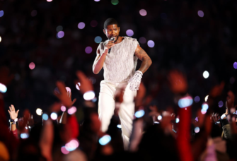 Usher performing at Super Bowl 2024 Halftime show