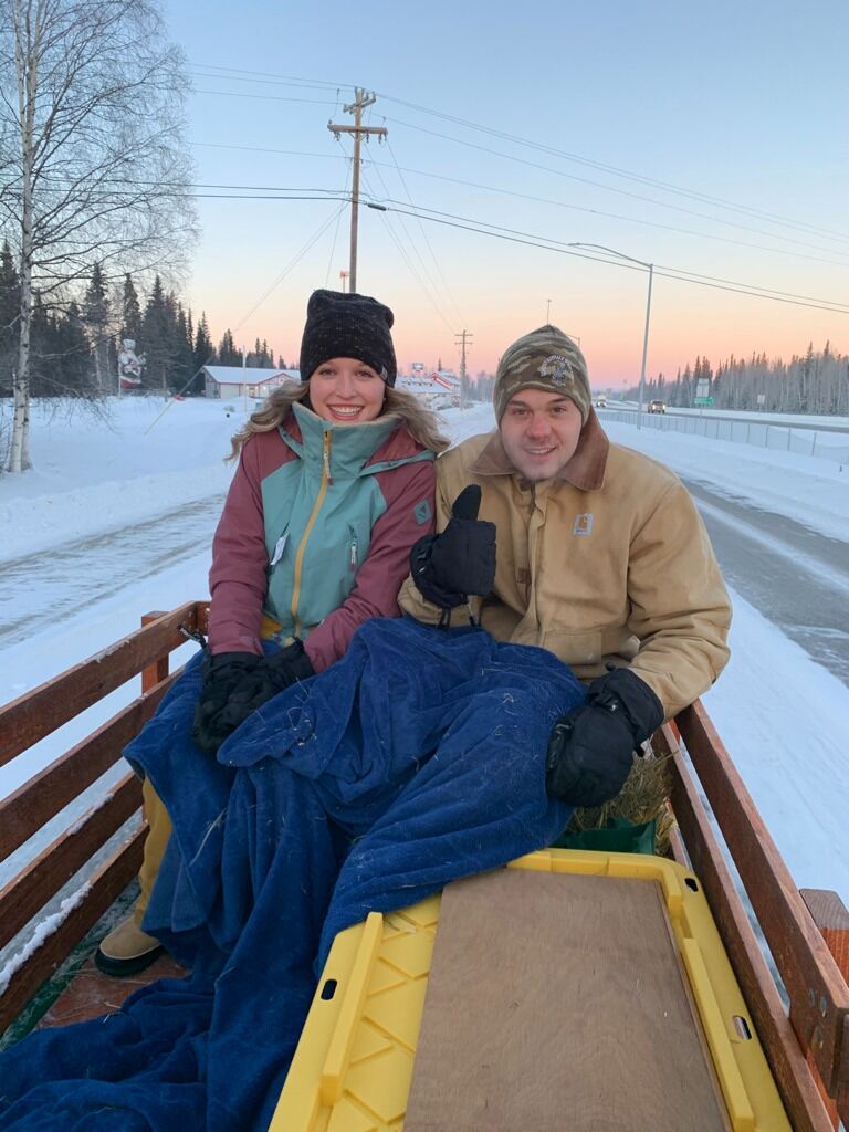 On a tractor ride with Grandpa Larry in North Pole, AK