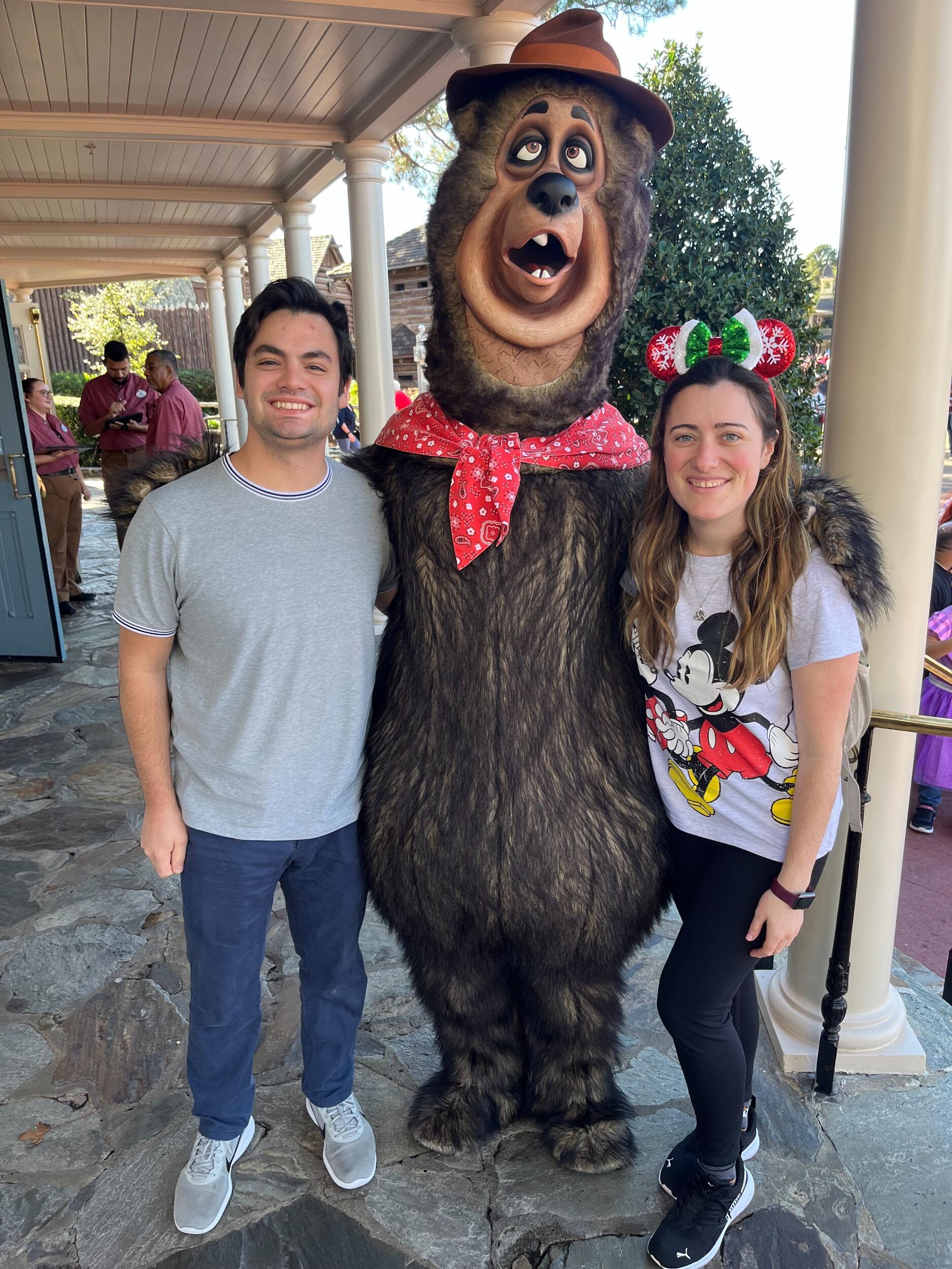 Celebrating Kelsey's birthday with this creepy bear in the Magic Kingdom