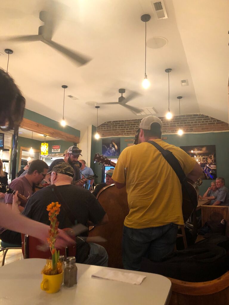 Matthew and Emily’s first date was on Friday, May 13th at Marino’s Lunch to hear bluegrass. Of course Matthew couldn’t resist getting up to play.