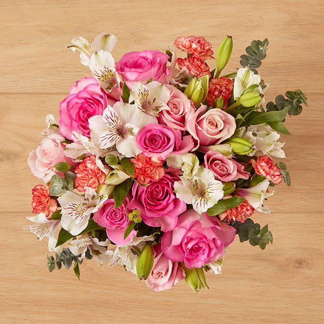 Beautiful bouquet with pink roses and greenery