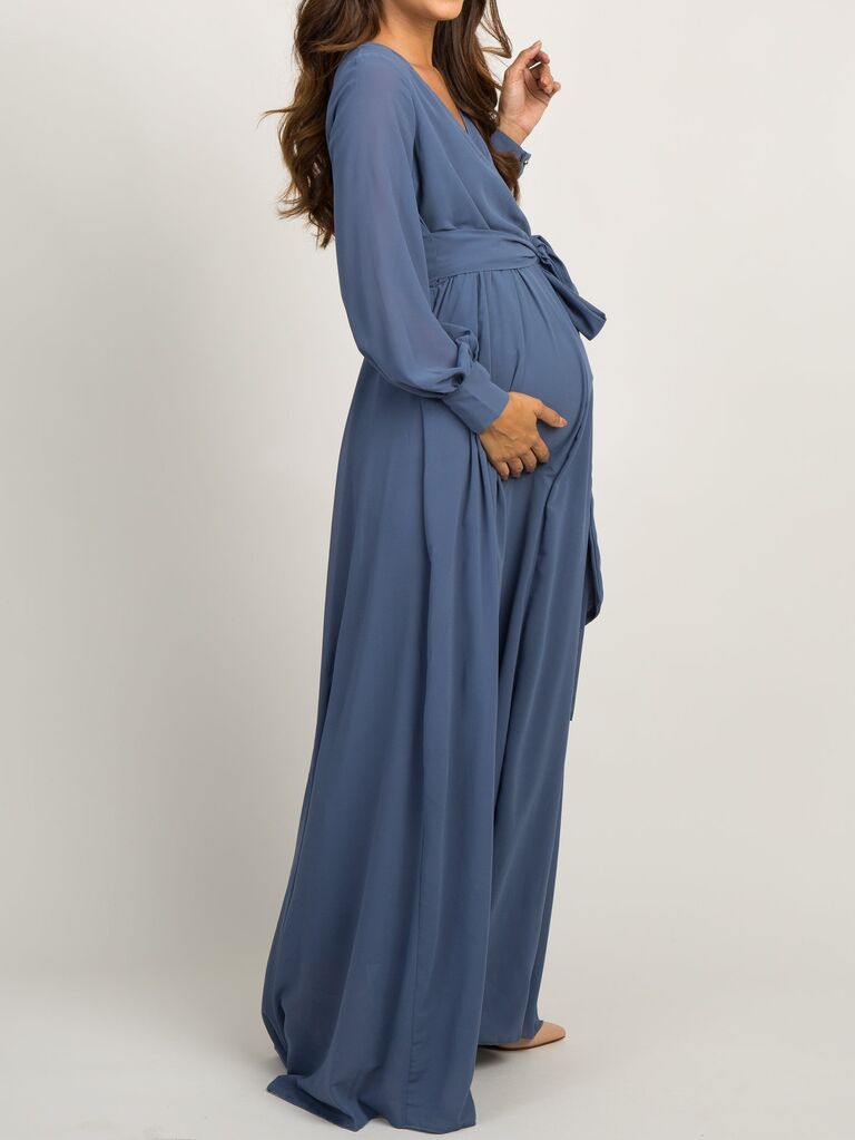 Dusty blue long-sleeve maxi maternity wedding guest dress on model