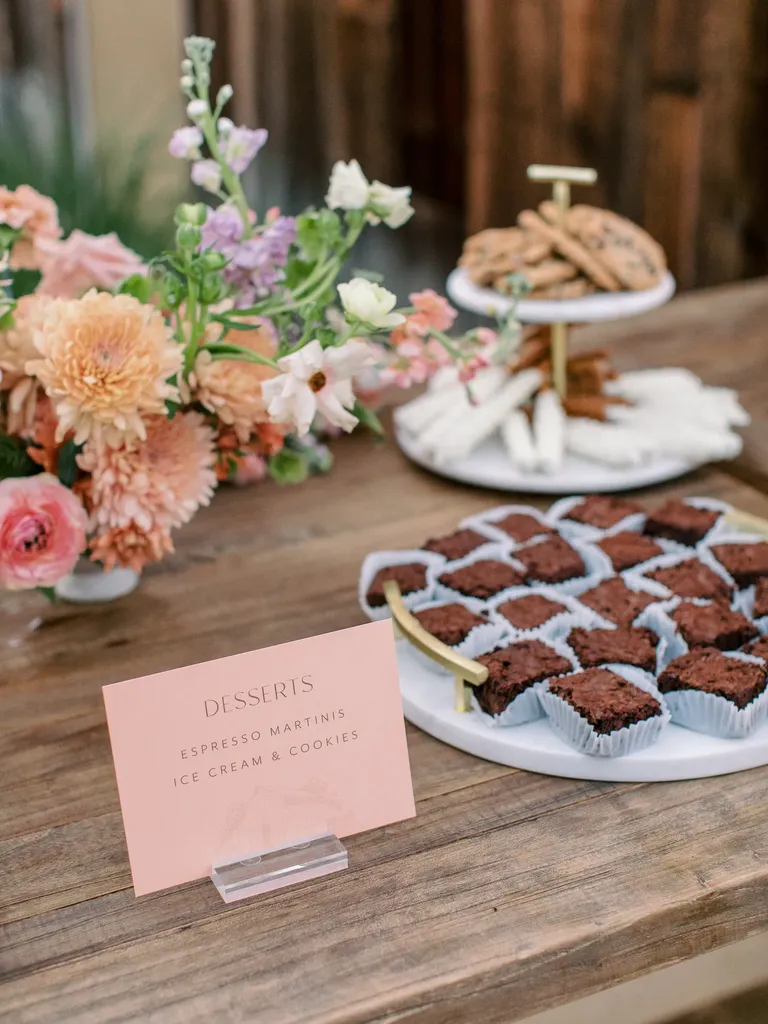 Cookies and brownies engagement party dessert table