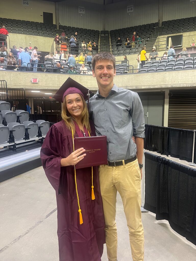 Enya graduates with a B.S in Psychology! Zach was always her biggest support in graduating early. 