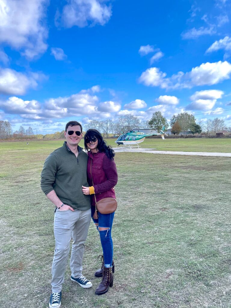 After Graduation, Josh celebrated by flying McKenzie the helicopter pictured behind us.