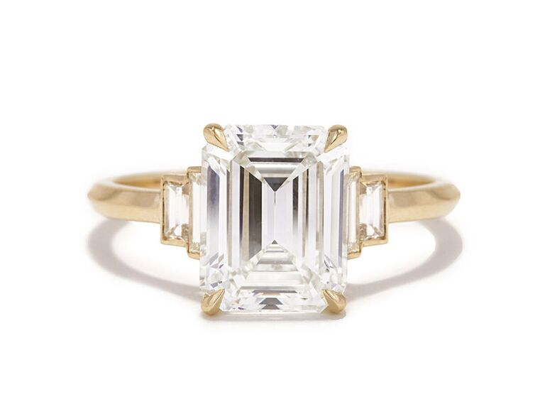 ashley zhang jewelry emerald cut diamond engagement ring with claw prongs baguette cut side diamonds and plain yellow gold band