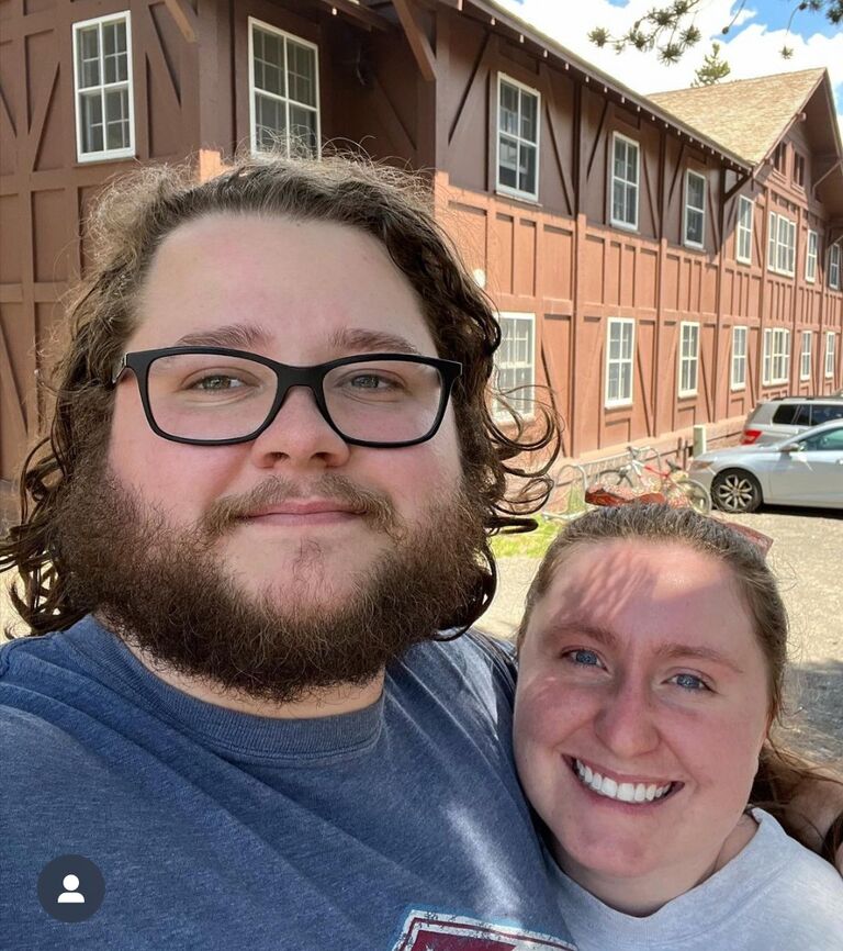 This is a picture of them standing almost in the exact spot where they first met in front of the employee dorm they lived in while they were living in Yellowstone and falling in love. 