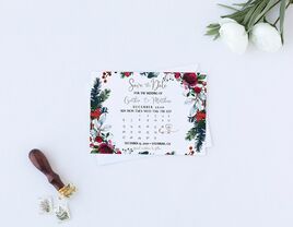 Countdown calendar design with Christmas florals bordering, heart around date of wedding