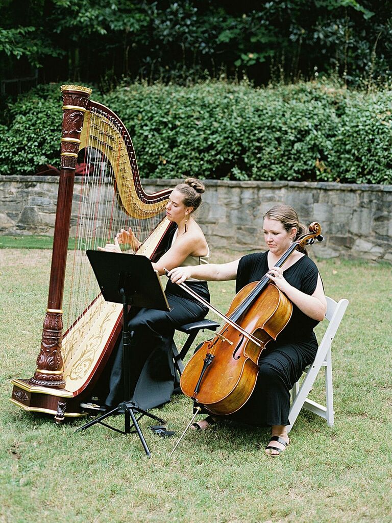 Harpist and cellist playing at a wedding ceremony. 