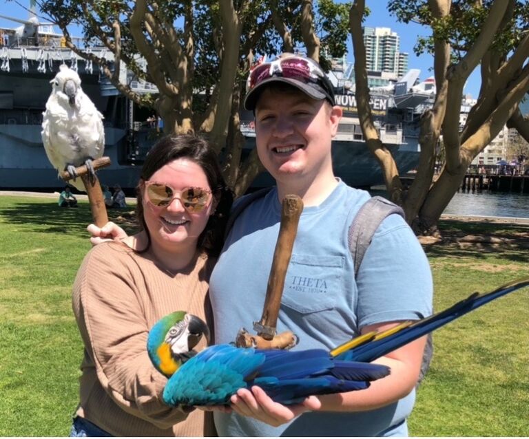 Stephen and Jessie took their first vacation together to San Diego, California. They spent a week there, seeing the city, enjoying the views, and eating good food. Jessie also faced her fear of birds for this picture. 