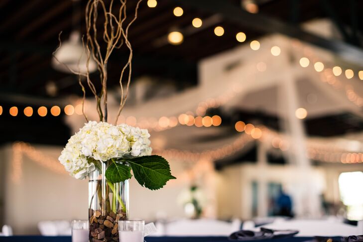 White Hydrangea Centerpieces And String Lights