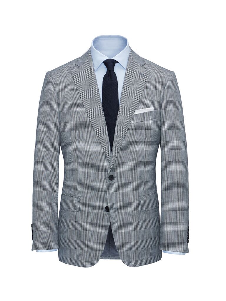 Checkered suit jacket for the father of the bride by Anthony Sinclair. 