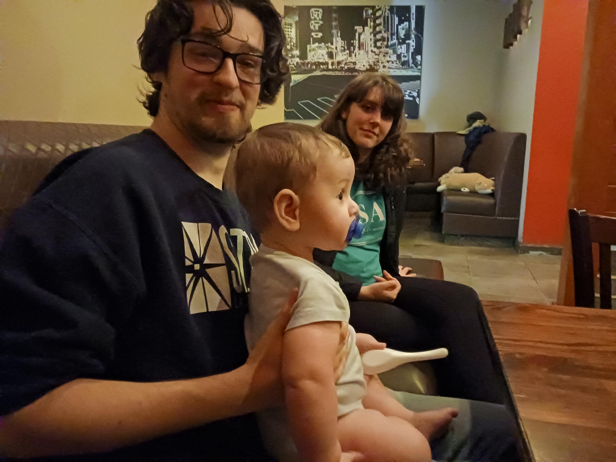 We went out to celebrate our friend David's birthday and his son Isaac decided to crawl into Arthur's lap and chill ( with mom, Jess, supervising of course) 