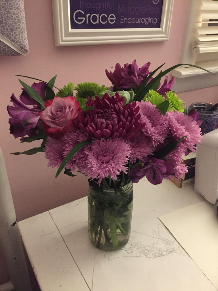 Only picture from their first date. He thoughtfully got her beautiful flowers and she was so embarrassed and horrified.