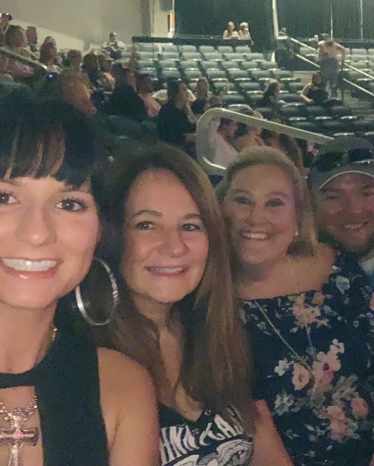 McKenzie, Denise, Addie, and Charlie at a Jelly Roll/ Brantley Gilbert Concert.