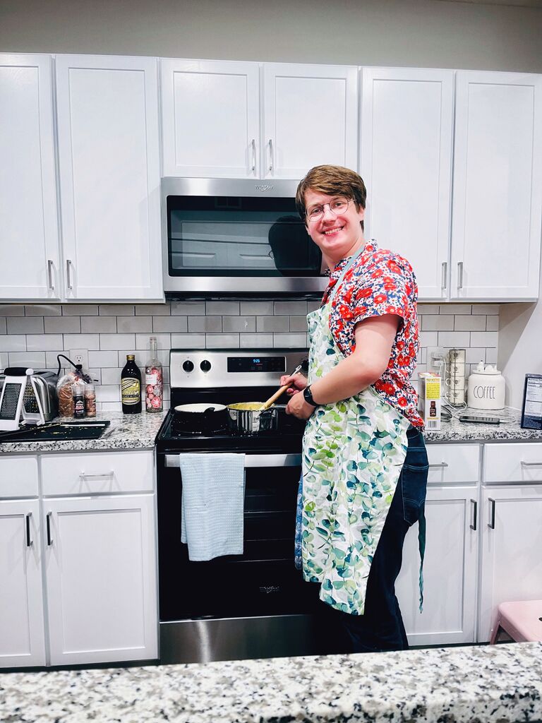 Griffy cooks for the first time in our new apartment.