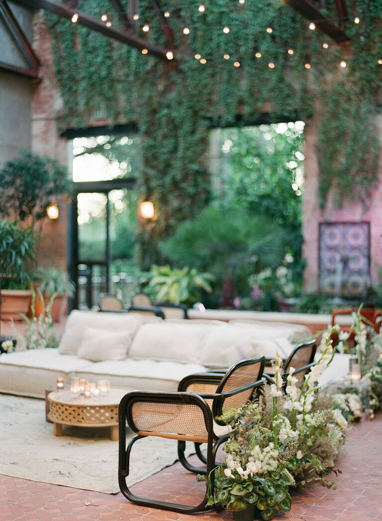 trendy unique indoor wedding reception venue (Hotel Emma courtyard San Antonio) with ivy growing on walls
