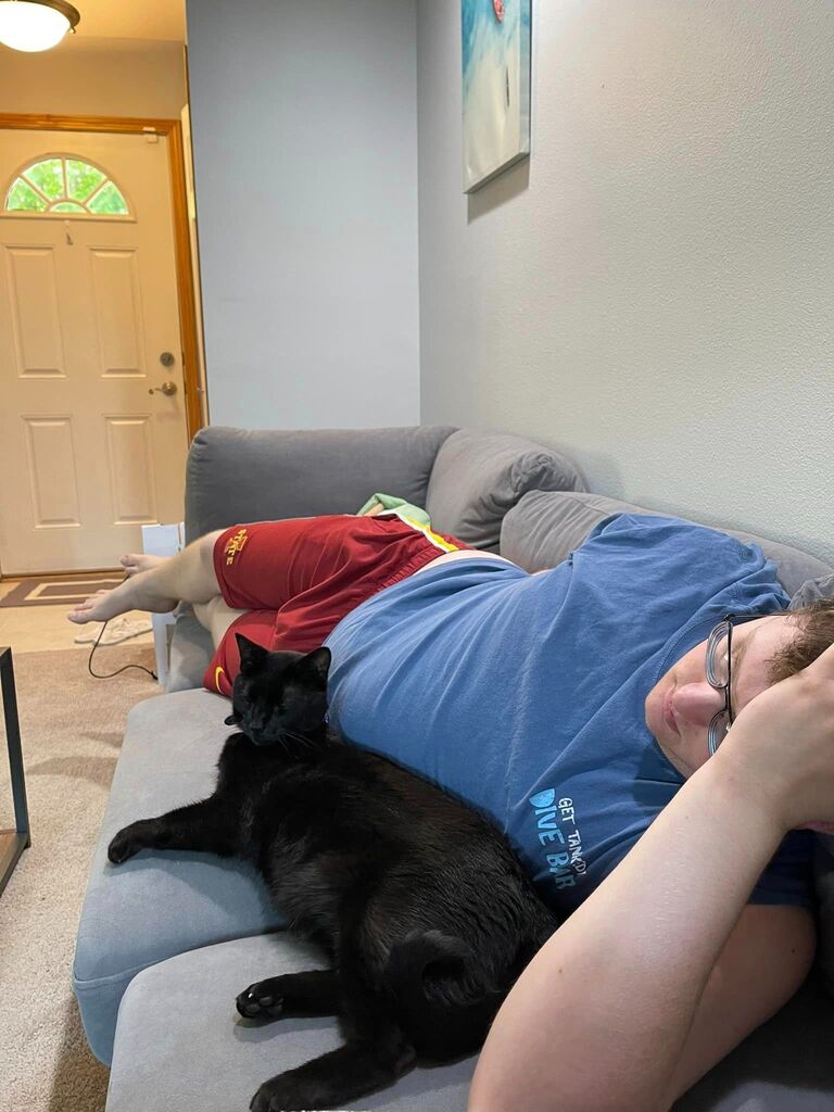 Stevie cat and Kyle became friends in our new house, Altoona,IA
