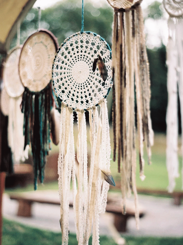 DIY bohemian wedding decoration of lace dreamcatchers. 