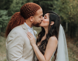 Bride and groom kissing on wedding day, The Cheapest Days of the Week to Get Married