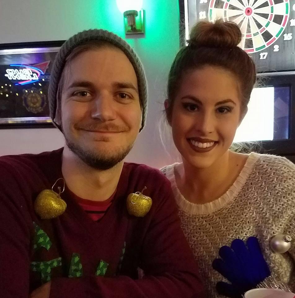 Celebrating our first Christmas together. We entered an ugly Christmas sweater contest and Ryan won first place.