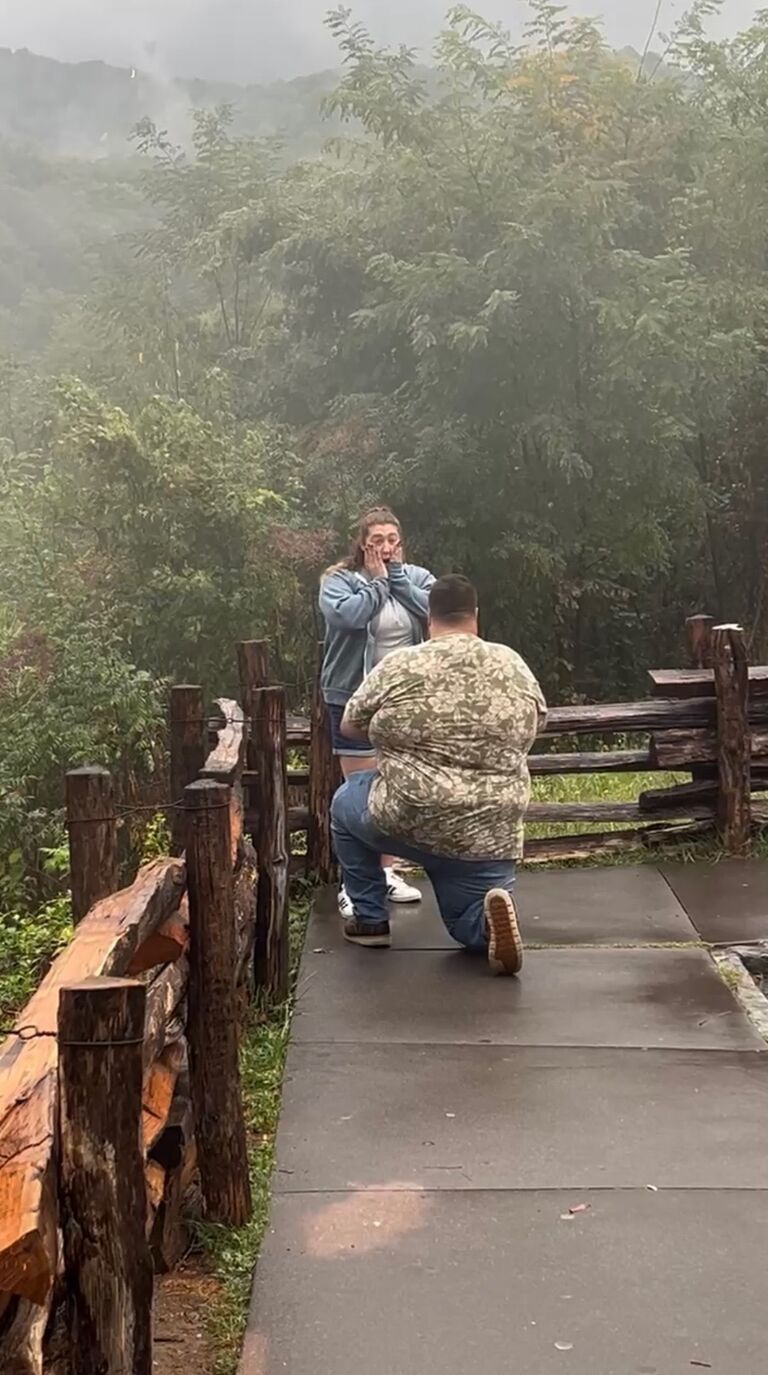While on vacation in Tennessee, Michael got down on one knee and asked Chelsea to be his wife.