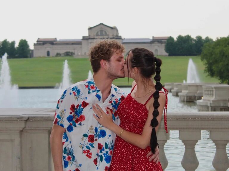                        The Moment:
On a warm rainy June night, Alissa and Corey were getting ready for a date night to go see Beauty and the Beast at the Muny. They had planned it for at least a year, given Belle is Alissas favorite princess. Unbeknownst to Alissa...she was about to be proposed to. The Muny is located in the biggest, beautiful, historically famous Forest Park. In fact their house is five minutes from it so you can only imagine how often they take advantage of going to the zoo, museums and of course stunning Art Hill. They were driving through the park to the Muny when suddenly Corey pulled over to the side of the road with no explanation. At the bottom of Art Hill by the fountains he guided Alissa out of the car, still no words. They walked to the front of the fountains. Cloudy with some sprinkling, it was silent and all you could hear was pitter patter of the rainfall. Alissa turned to look at Corey and there he was on one knee with few words to say because Alissa knows in her heart it was about damn time, he didn't have to say much! Asking will you marry me Corey was shaking like a leaf and Alissa was overwhelmed with her love for him.