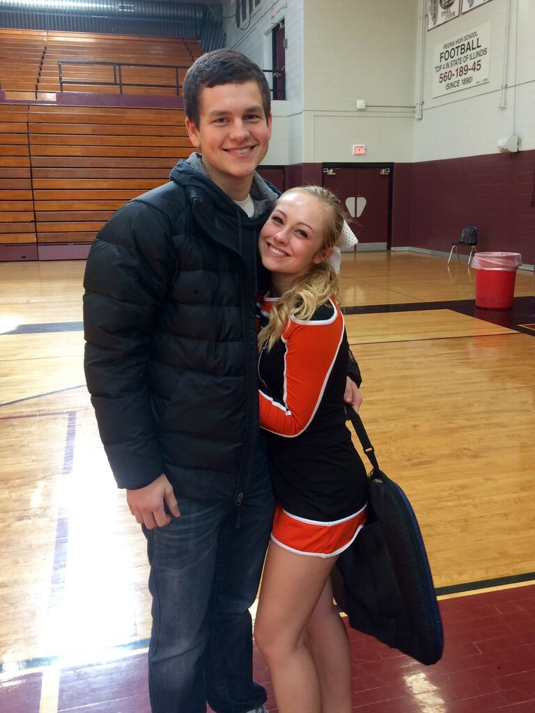 Nick supports Delaney at a cheerleading competition